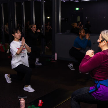 _B7A6242 group exercise class lunging